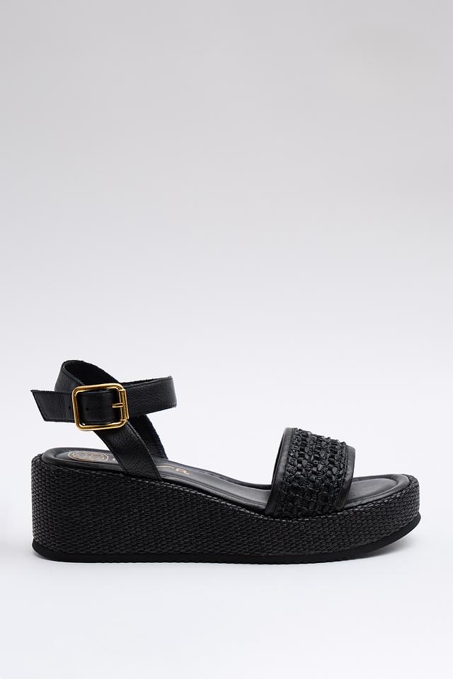 Сандалии Unisa на танкетке чёрные