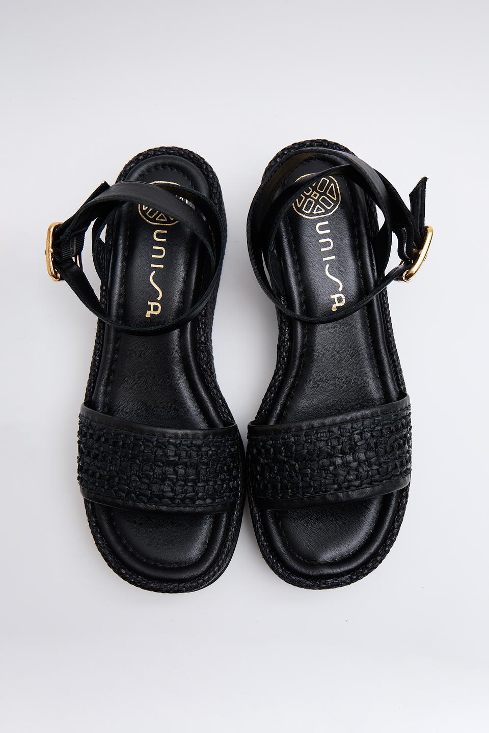 Сандалии Unisa на танкетке чёрные