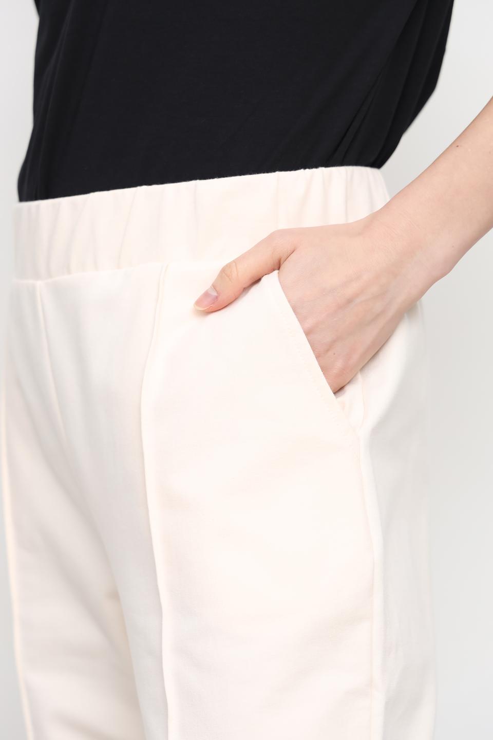 Спортивные брюки UNQ бежевые