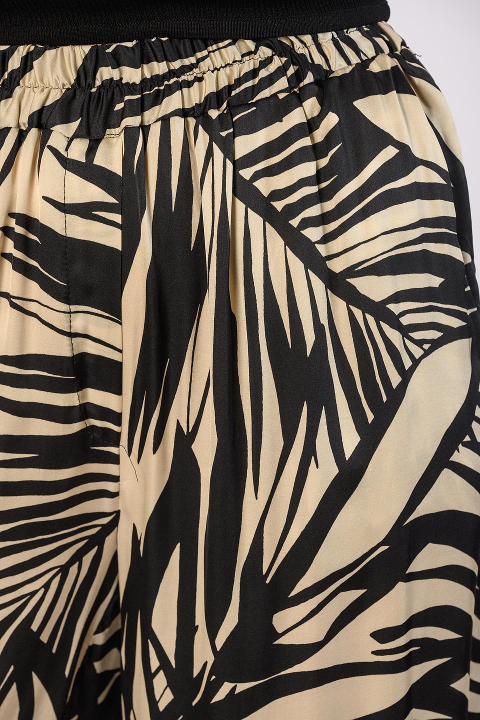 Брюки Icona с принтом листья бежевые