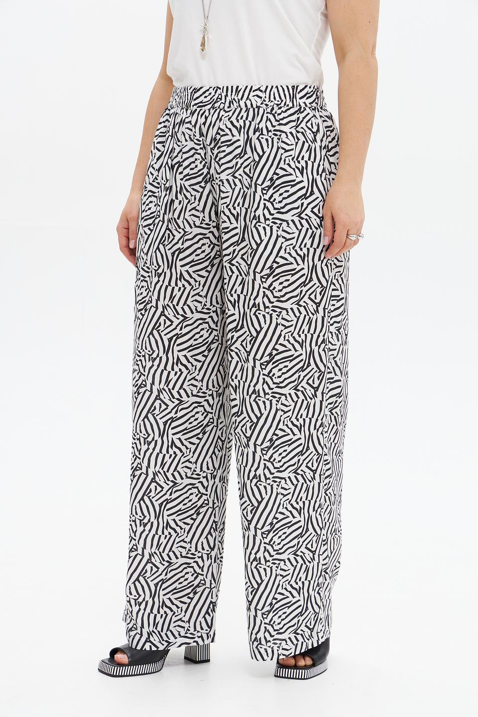 Брюки клёш UNQ принт зебра