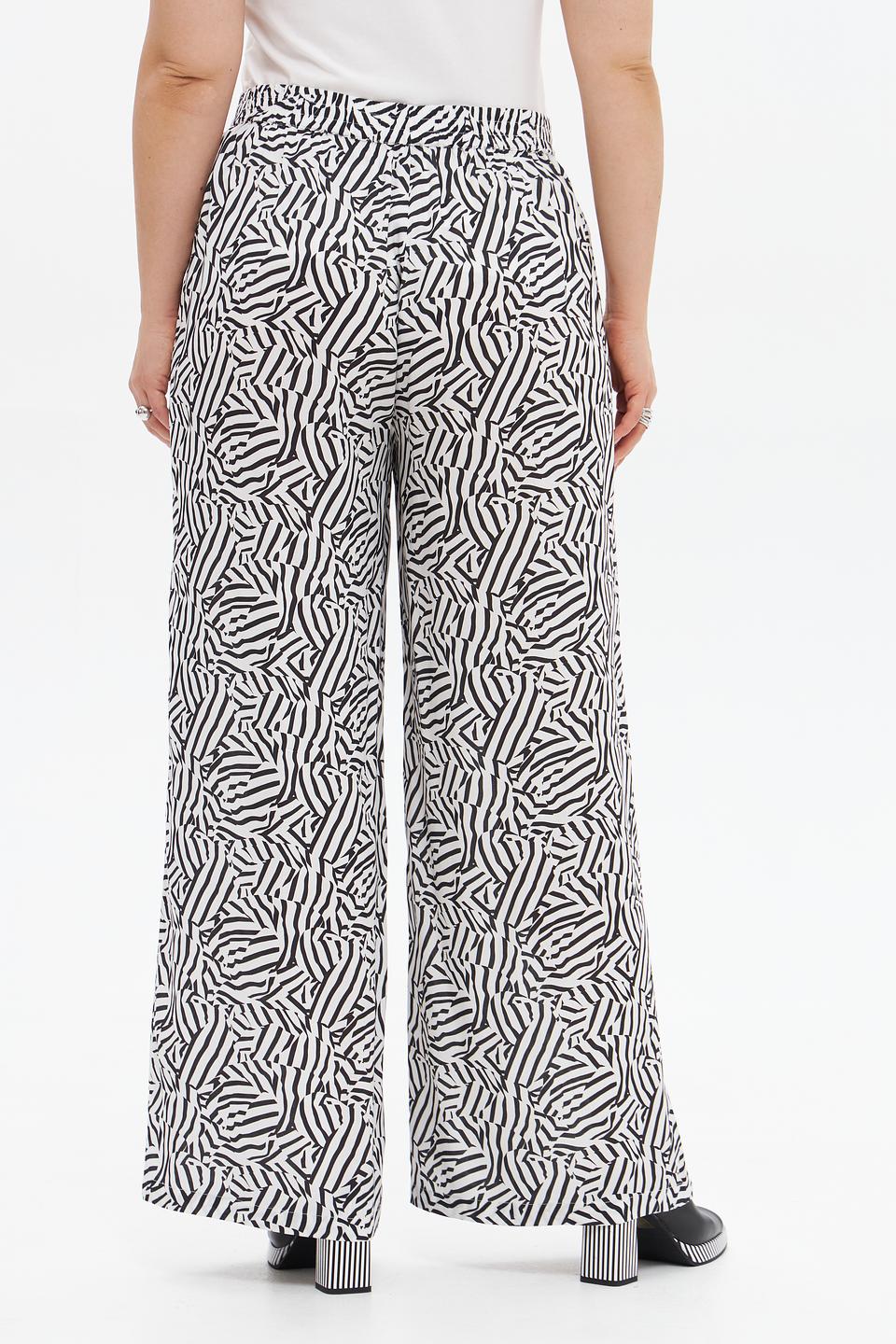 Брюки клёш UNQ принт зебра