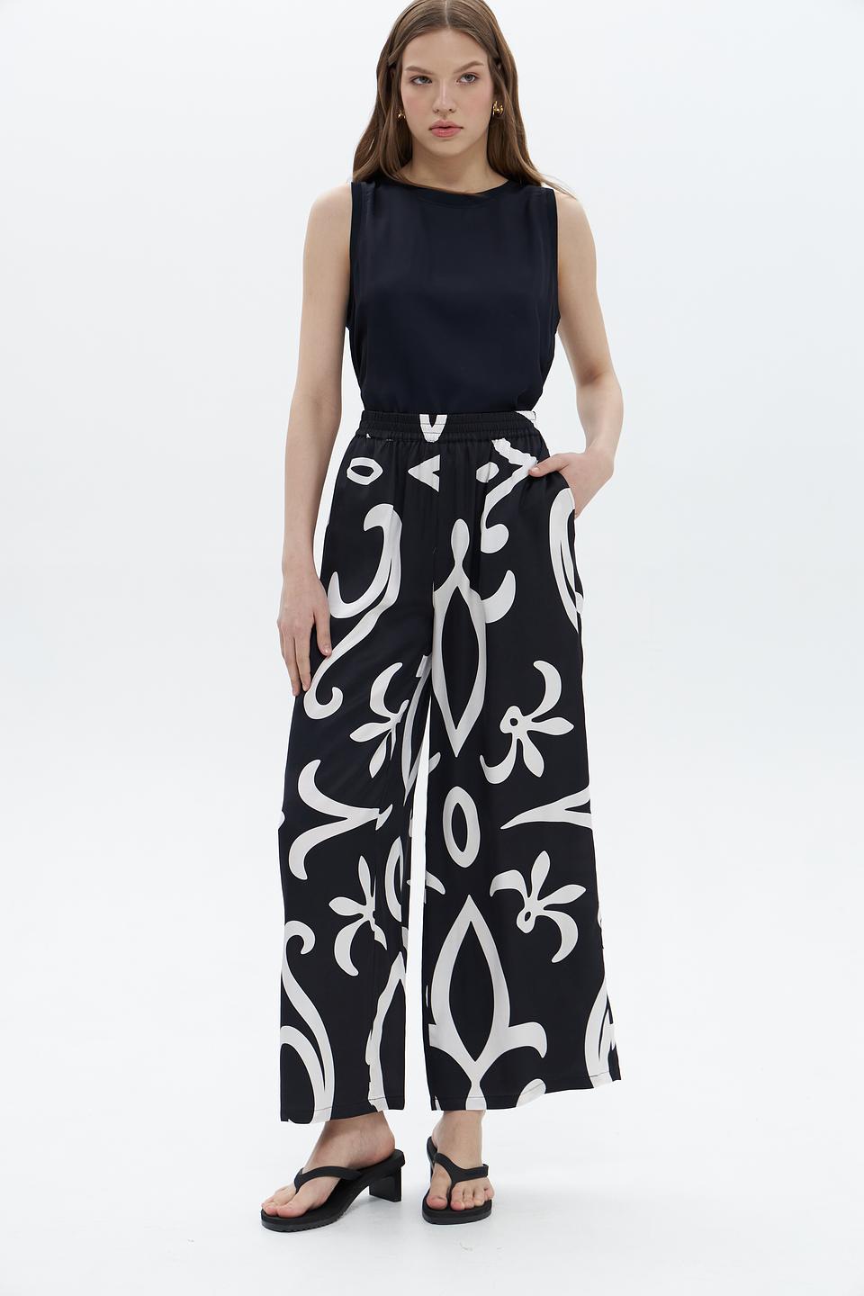 Брюки UNQ с принтом