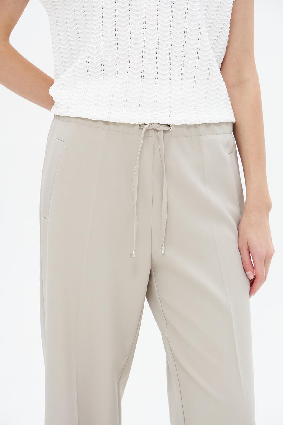 Брюки клёш Lecomte бежевые